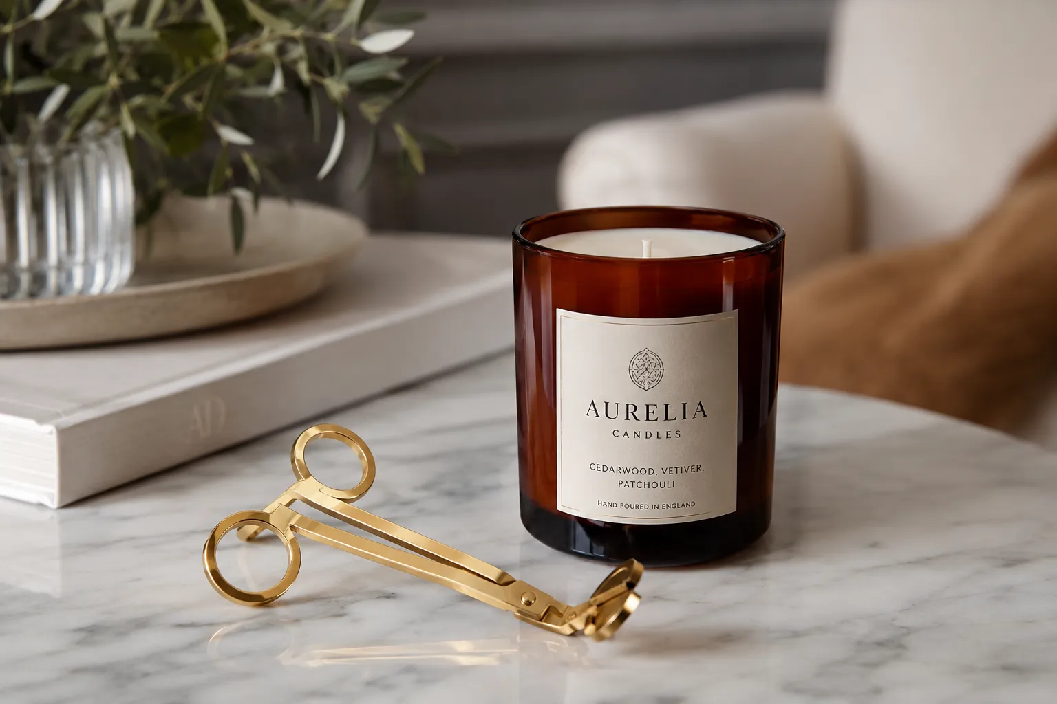 A hand-poured soy candle burning with a full, edge-to-edge wax pool on a marble surface